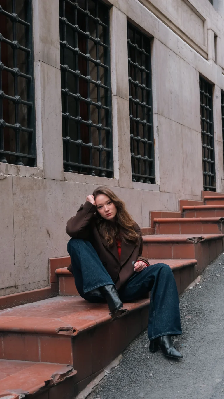 a woman wearing structured jackets and jeans fall outfit woman